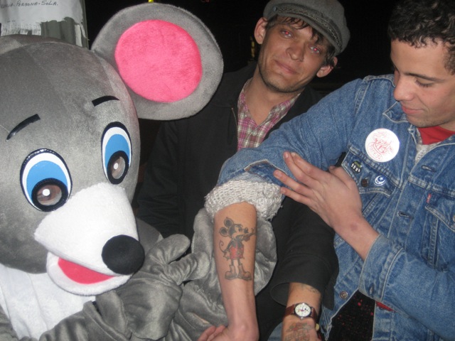 mouse tattoo. with a Mickey Mouse tattoo